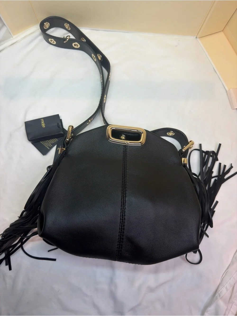 Maje Black Shoulder Bag with Gold Accents and Tassels